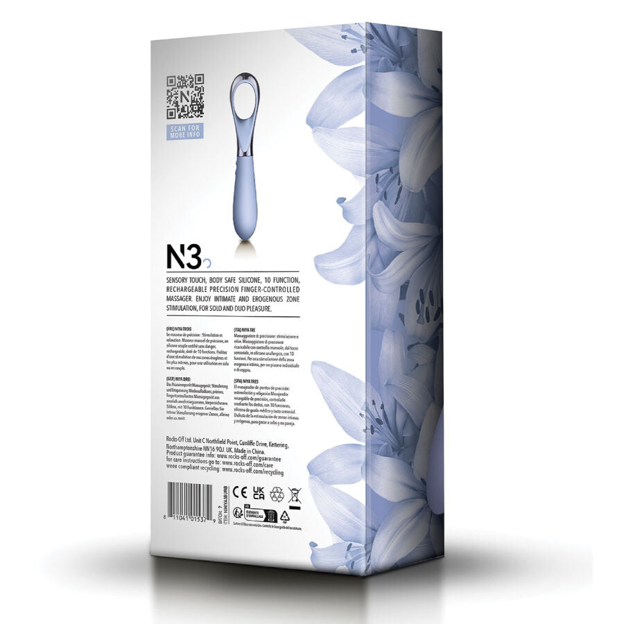 Dos de la boite NIYA N3 sur fond floral clair, montrant le stimulateur a poignee anneau avec descriptifs, pictogrammes et code-barres du vibromasseur point G rechargeable