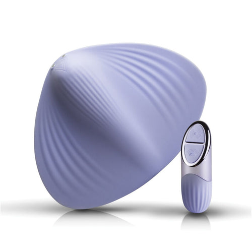 Vibromasseur clitoridien NIYA N5 en silicone mauve, forme coquille nervuree et petite telecommande ronde a cote, masseur externe sans contact rechargeable a 10 modes