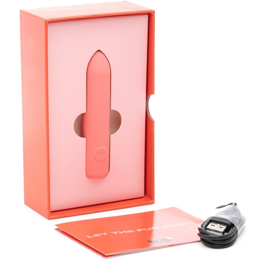Coffret orange The Bullet ouvert, le bullet corail logé dans son écrin rose, câble USB et notice posés à côté, packaging déballé du mini vibromasseur présenté sur fond blanc épuré.