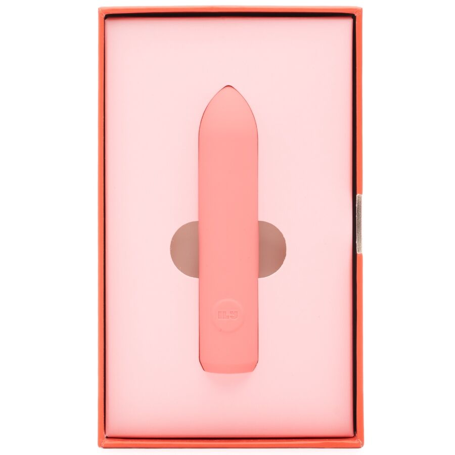 Écrin rose The Bullet présentant le mini bullet corail logé dans sa découpe centrale, packaging ouvert vu de face mettant en valeur le produit sur fond blanc parfaitement épuré.