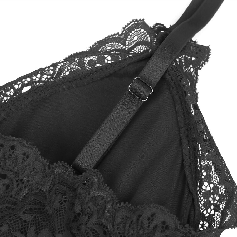 Gros plan sur la bretelle reglable du teddy noir Subblime et sa boucle, jonction avec la dentelle florale du buste, detail du systeme d'ajustement.