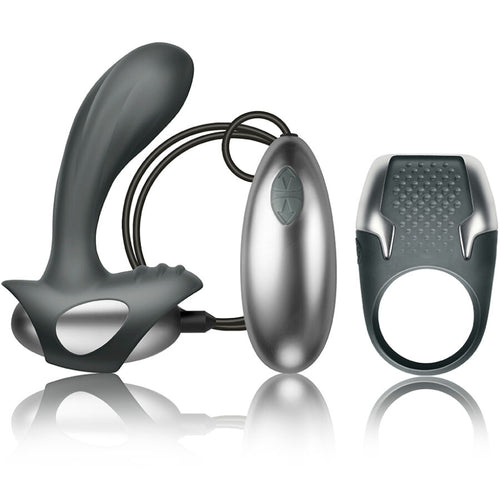 Coffret couple Excite avec masseur de prostate anthracite a fil, telecommande filaire ovoide et anneau penien texture, vue produit des trois elements etanches.