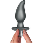 Plug anal vibrant Idosi tenu entre les doigts, gros plan sur l'embout incurve, l'ogive vibrante amovible doree et la base evasee, silicone doux etanche.