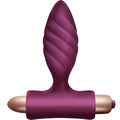 Plug anal vibrant torsade Oryx en silicone medical prune, vue de face sur l'embout fin en spirale, la base en T et le module vibrant dore, glisse en douceur etanche.