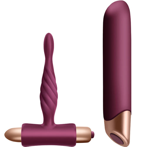 Plug anal torsade du coffret Rapture en silicone prune, vue de face sur l'embout en spirale effile, la base en T et le module vibrant dore, jouet debutant etanche.