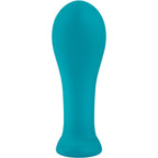 Plug anal turquoise taille L debout, tete arrondie genereuse et tige effilee sur base plate, sensation de plenitude reservee aux confirmes en silicone.