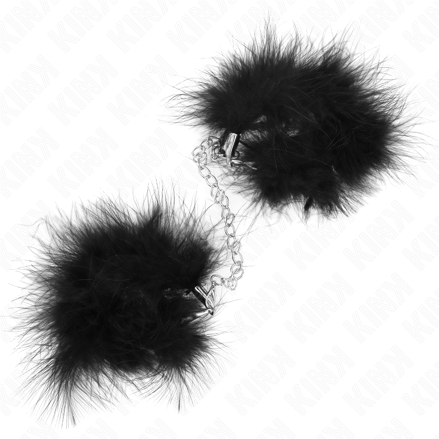 Manchettes de poignets en cuir garnies de plumes — vue de profil