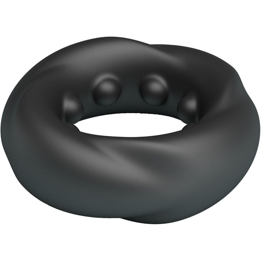 Anneau Daquez Crazy Bull en silicone souple gris fume presente en angle, picots et rainures internes torsadees concus pour maintenir la fermeté.