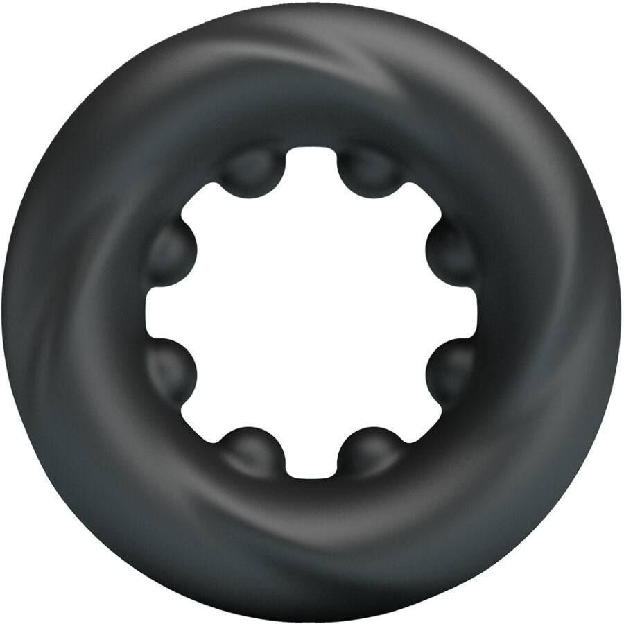 Vue de face de l'anneau Daquez Crazy Bull en silicone gris fume, ouverture centrale bordee de crans internes torsades pour une stimulation accrue.