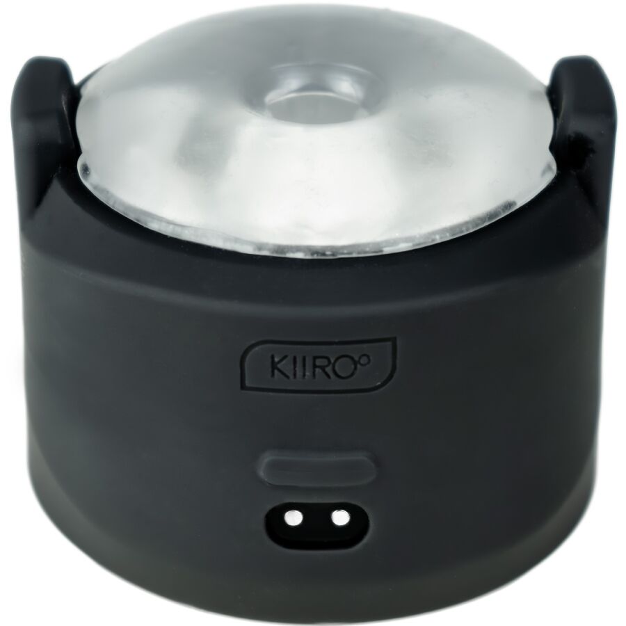 Vibromasseur de poche pour homme Kiiroo de profil, coque silicone souple noire avec boutons de commande, format compressible et etanche a deux moteurs.