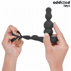 Masseur de prostate Addicted a perles et anneau tenu entre les mains pour montrer sa souplesse, silicone noir flexible, stimulateur prostatique telecommande.