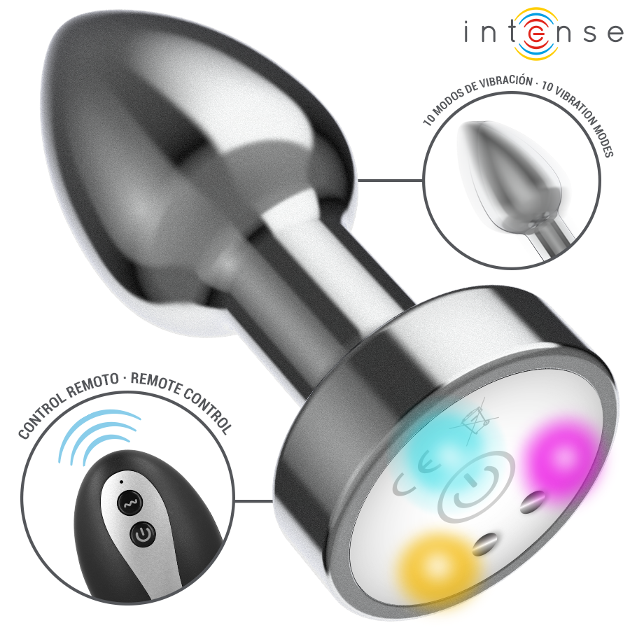 Gros plan du plug anal en metal chrome a base LED multicolore avec telecommande, forme conique evasee, zoom sur la commande a distance des vibrations