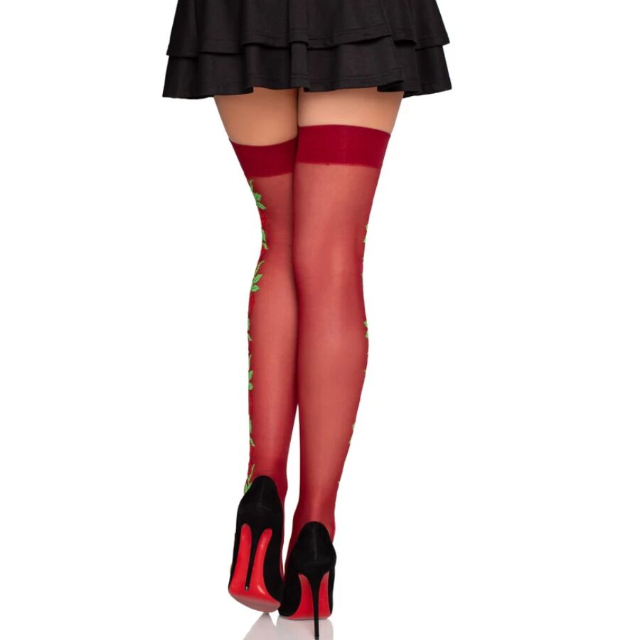 Vue arriere des bas rouges a motif roses grimpantes portes sur jambes nues, escarpins a semelle rouge, ligne florale remontant le long de la jambe.
