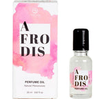 Huile parfumee aux pheromones Afrodis pour femme, format 20 ml. Flacon roll-on transparent presente a cote de sa boite rose degrade, senteur caramel gourmande.