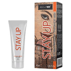 Creme intime stimulante Stay Up pour homme aux plantes 75 ml, tube argent et etui au visage en gros plan, formule au fenugrec et gingembre a parfum aphrodisiaque.