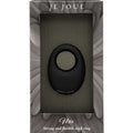 Boîte Je Joue présentant l'anneau Mio noir derrière la fenêtre transparente, fond de plume gris et mention strong and flexible cock ring imprimée en pied du packaging sur fond blanc.