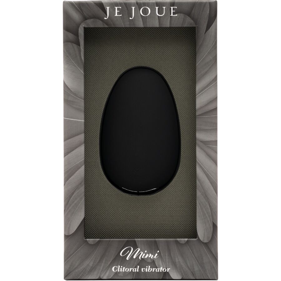 Boîte cadeau grise du vibrateur clitoridien Mimi de Je Joue, fenêtre transparente laissant voir le galet noir en silicone, mention « Clitoral vibrator » imprimée dessous.