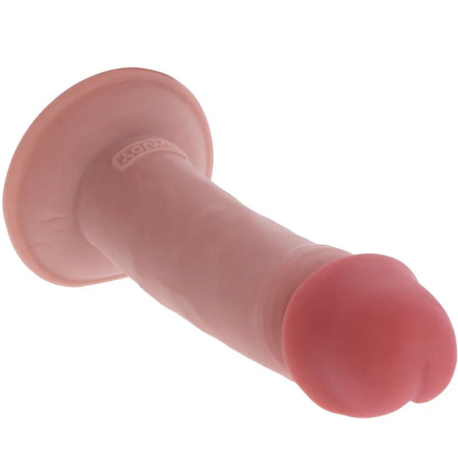 Gode realiste Get Real chair pose a plat, large ventouse et gland prononce visibles, tige veinee en silicone souple pour un usage mains libres maitrise en solo.