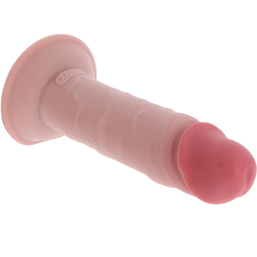 Gode realiste Get Real chair pose a plat, ventouse et gland detaille bien visibles, tige epaisse en silicone double densite pour un usage mains libres confortable.