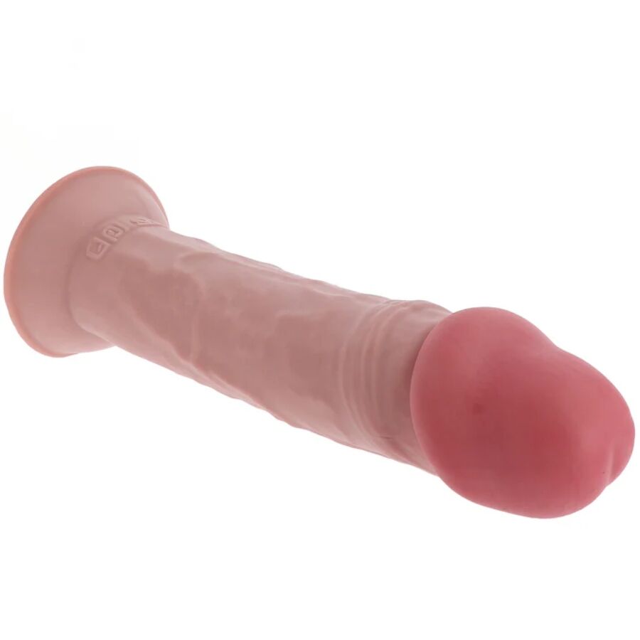 Gode realiste Get Real chair pose a plat, ventouse et gland detaille bien visibles, longue tige epaisse en silicone double densite pour un usage mains libres confortable.
