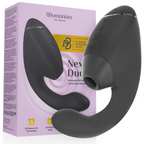 Boîte lilas Womanizer 'Next Duo' à gauche et stimulateur double noir à droite : embout de succion clitoridien et tige courbe interne en silicone mat, sans anatomie.