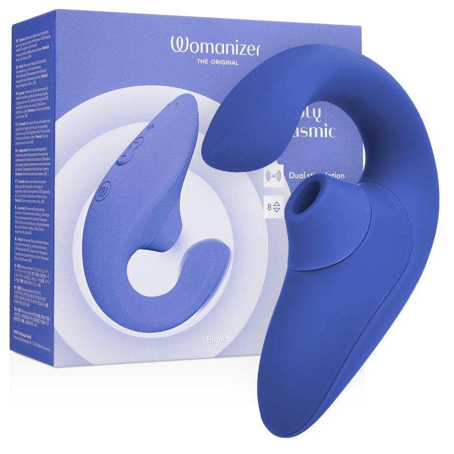 Vibromasseur lapin Womanizer bleu présenté avec sa boîte pervenche : ondes d'air pour le clitoris et tige vibrante pour le point G, silicone double stimulation.