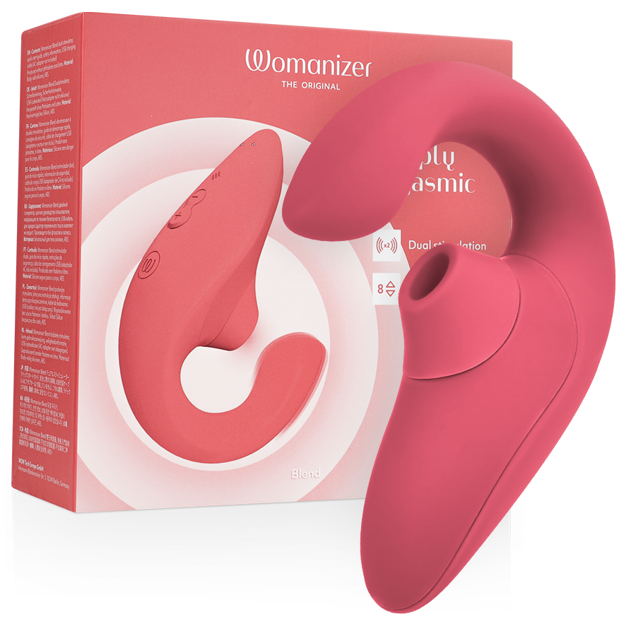 Vibromasseur lapin Womanizer corail posé près de sa boîte rose : branche d'aspiration pour le clitoris et tige vibrante pour le point G, silicone double stimulation.