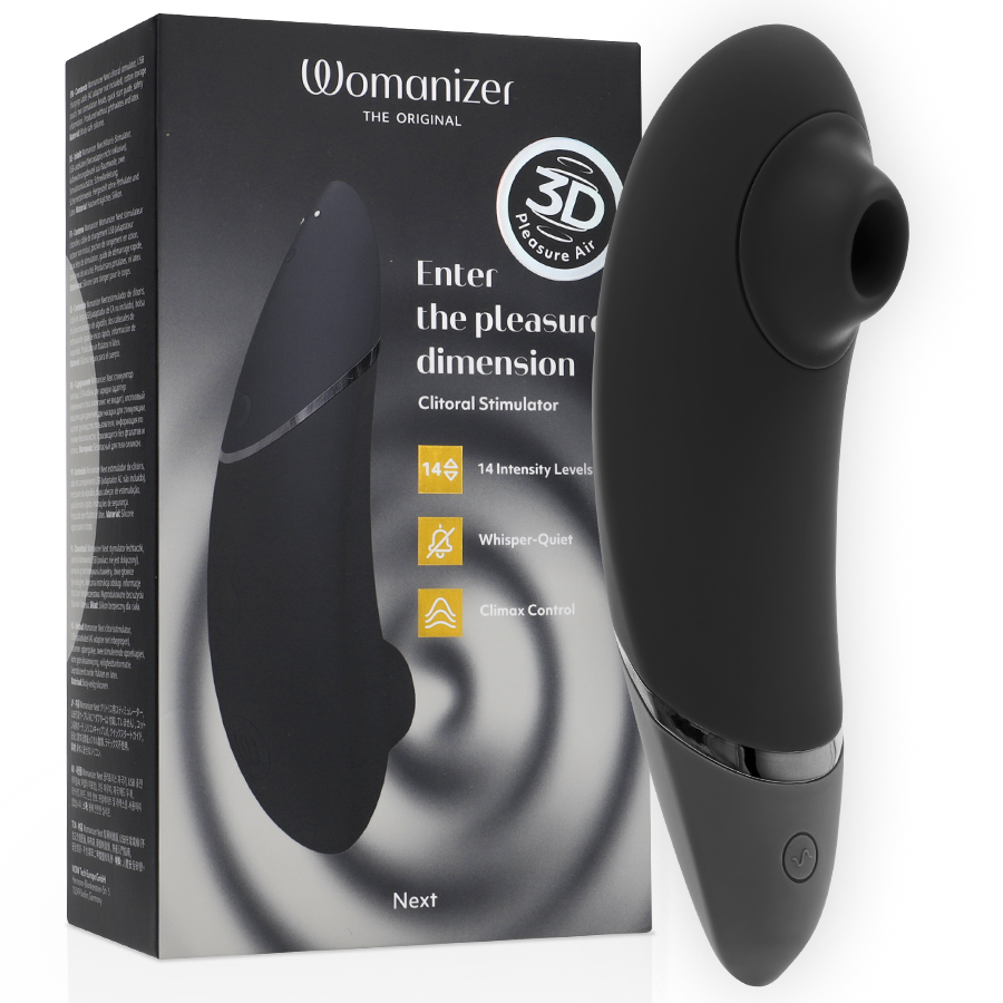 Boîte noire du Womanizer Next avec le stimulateur noir intégré au visuel de face, badge 3D et mention Enter the pleasure dimension, packaging produit sans anatomie.