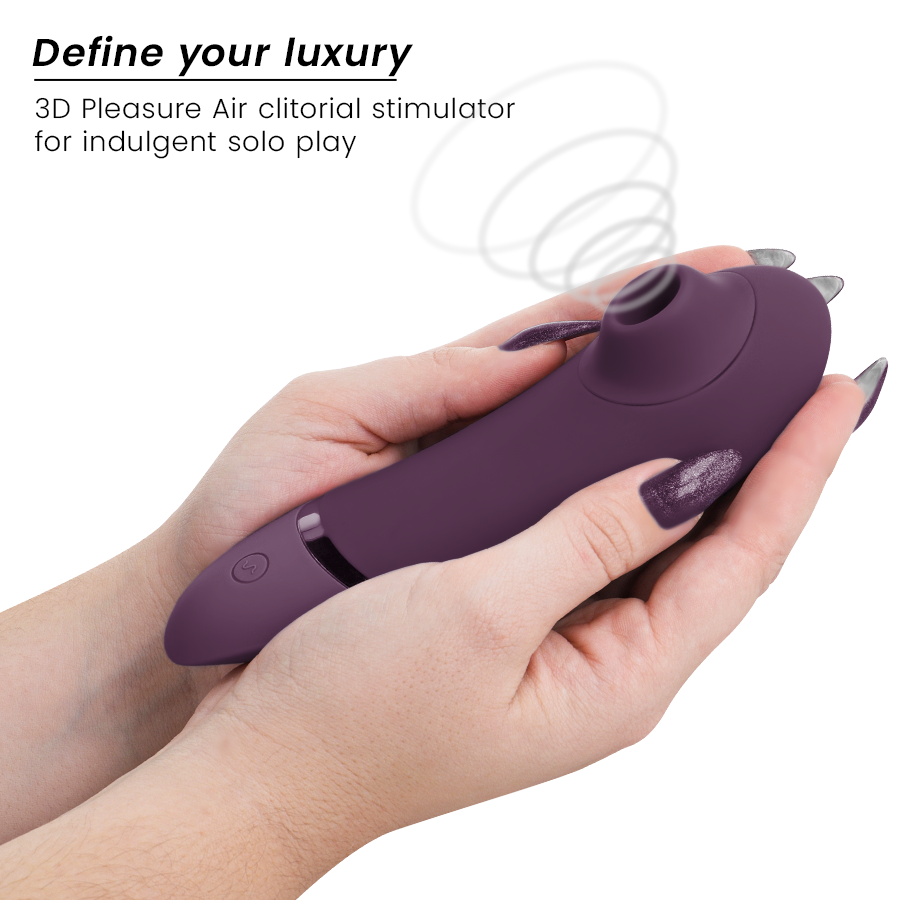 Main tenant le Womanizer Next aubergine avec schéma d'ondes d'air figurant l'aspiration 3D Pleasure Air sans contact, texte Define your luxury en surimpression.