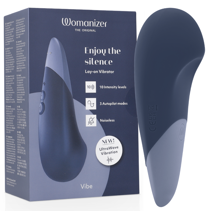 Boîte bleu nuit du vibromasseur à poser UltraWave Vibe à côté du stimulateur bleu galbé bicolore, mention Enjoy the silence, technologie UltraWave silencieuse.