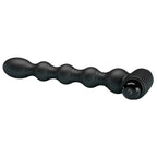 Plug anal a billes graduees Mr Play presente a l'horizontale, silicone noir souple et capsule vibrante a la base, chapelet progressif pensee pour une penetration en douceur