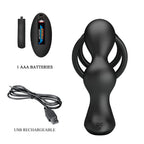 Masseur de prostate Mr Play avec anneaux peniens presente avec sa pile AAA et son cable USB, silicone noir aux anneaux jumeaux pour une stimulation prostatique vibrante