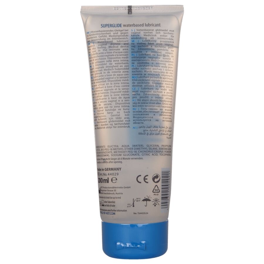Dos du tube Superglide lubrifiant base eau, etiquette grise avec mode d'emploi et pictogrammes, lubrifiant a la glisse soyeuse sans residu.