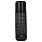 Dos du flacon Premium Glide lubrifiant silicone 100 ml, notice multilingue dense sur fond noir, lubrifiant soyeux qui ne seche pas.