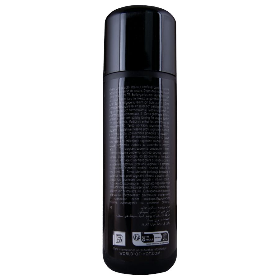 Verso du flacon noir Premium Glide lubrifiant silicone, etiquette sombre avec notice et pictogrammes recyclage, lubrifiant glisse longue duree.