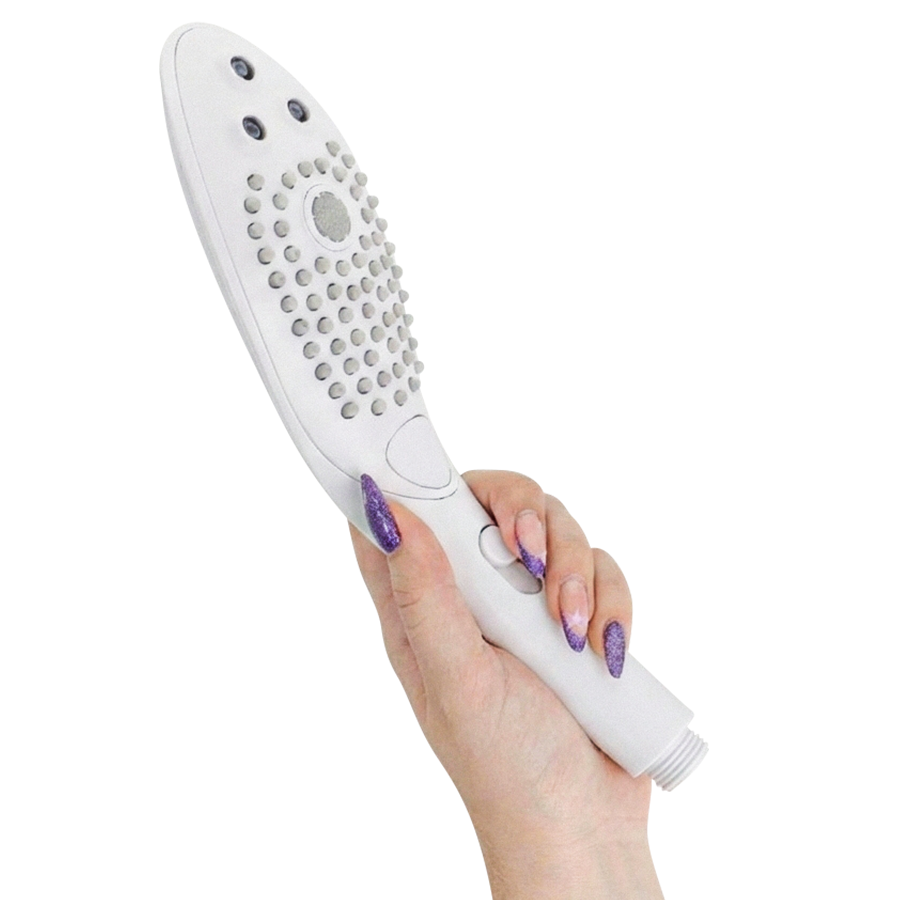 Pommeau de douche Womanizer Wave blanc tenu de face