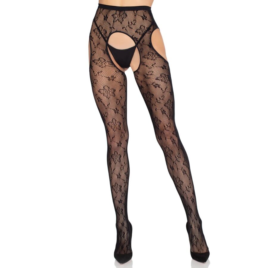 Collant resille noir floral a ouverture a l'entrejambe porte de face, jambes et bassin nus sous la maille ajouree, graphisme delicat, style audacieux.