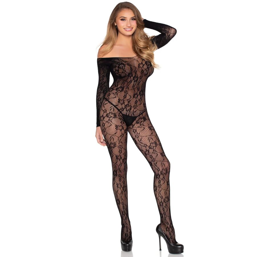 Bodystocking dentelle florale noir a manches longues porte de profil, transparence sur le corps, encolure bateau, allure sensuelle pour soiree intime.