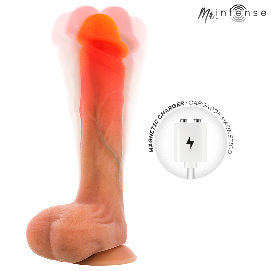 Bradley godemichet vibrant chauffant — gros plan sur le gland avec effet chaleur rouge-orangé et flou de vibration