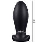 Plug anal Extreme en silicone noir avec cotes 16 cm de hauteur et diametre 4 cm, gabarit allonge pour une dilatation anale avancee.