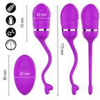 Sookie œuf vibrant violet — tenu à deux mains, gros plan sur la texture striée et le bouton marche/arrêt