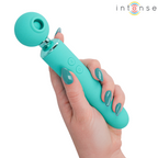 Hamby stimulateur multifonctionnel turquoise — tenu en main, gros plan sur l'ouverture de succion de la tête