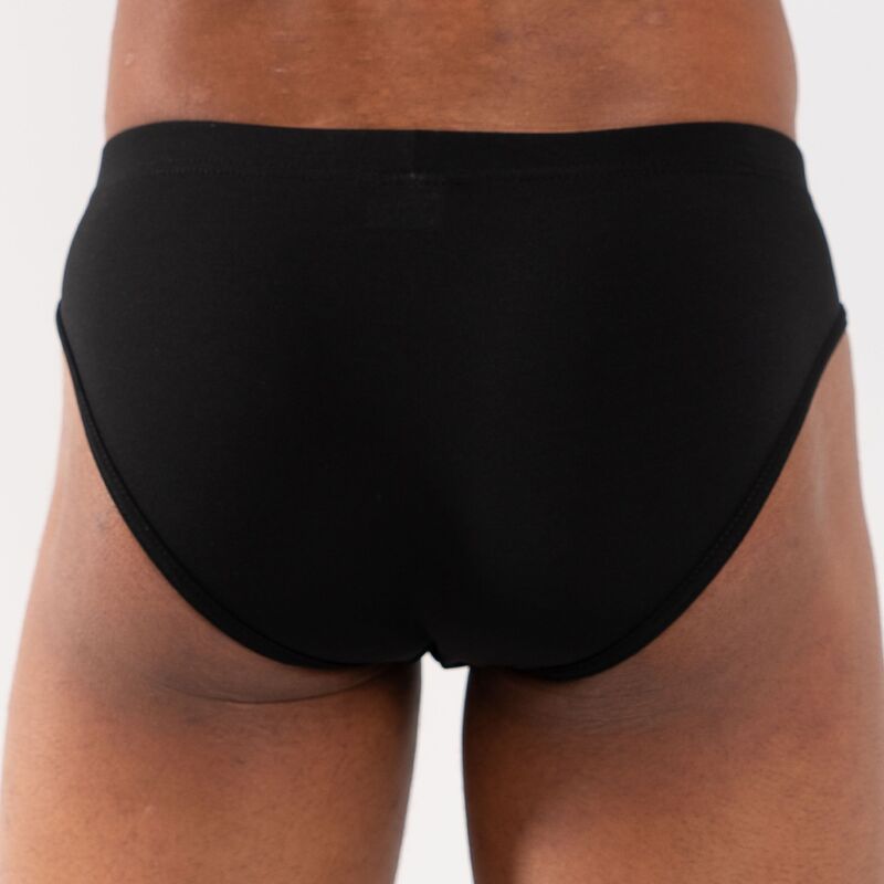 Slip noir uni vu de dos, coupe classique couvrante, taille élastique noire.