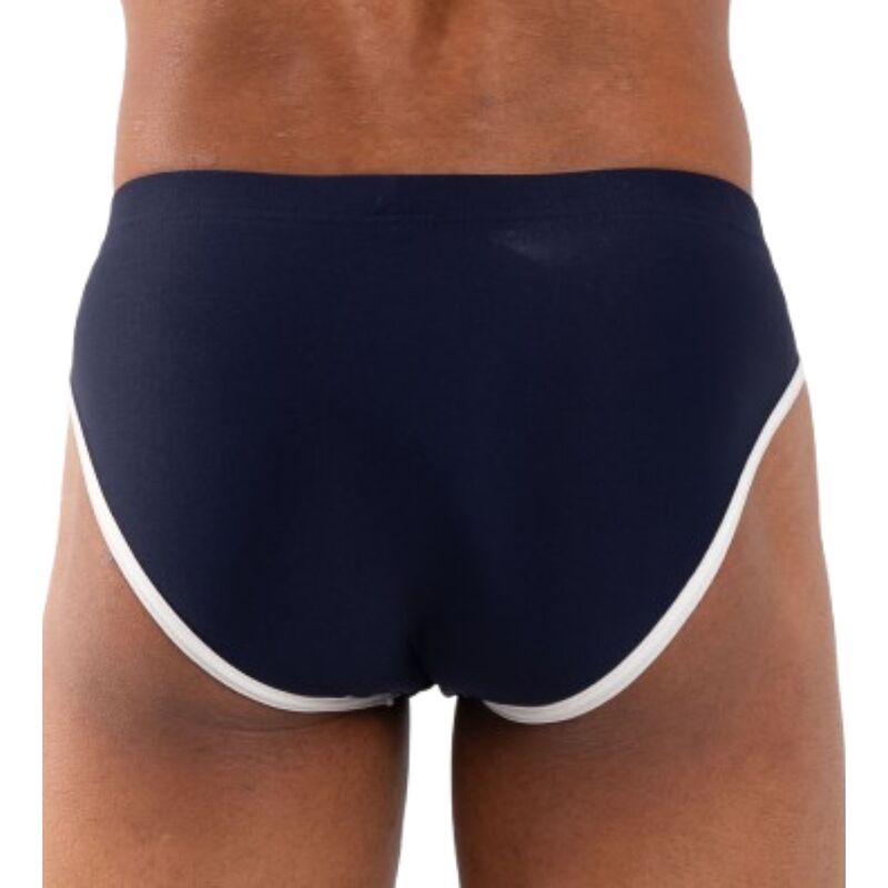 Slip bleu marine vu de dos, liserés blancs sur les côtés, coupe classique couvrante.