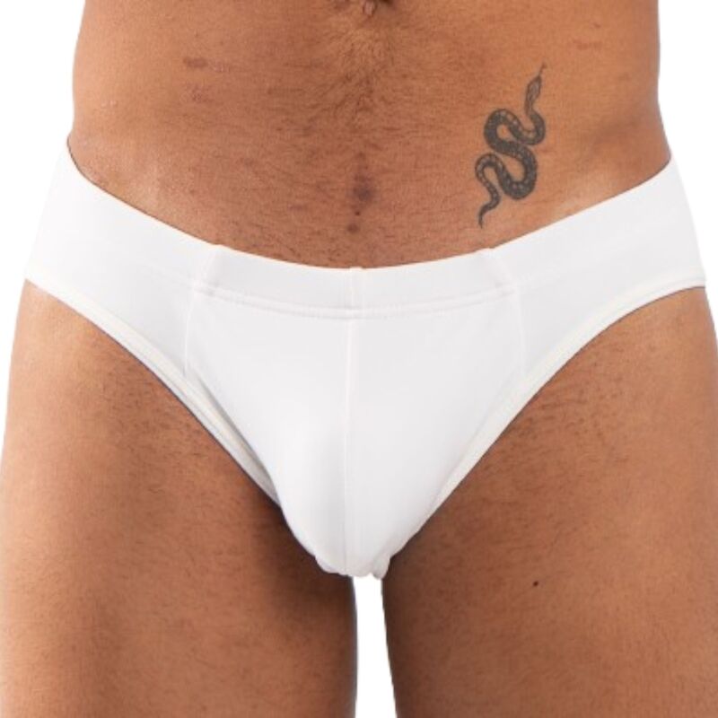 Slip blanc BURN 021 vu de face en gros plan à la taille, tatouage de serpent visible sur la hanche