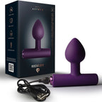 Boîte Nova Astryx Rocks Off et plug vibrant violet aubergine sortis de l'emballage