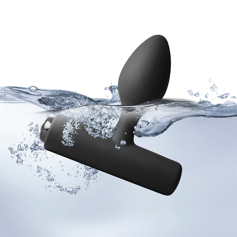 Plug vibrant Nova Solaris noir à moitié immergé, éclaboussures d'eau