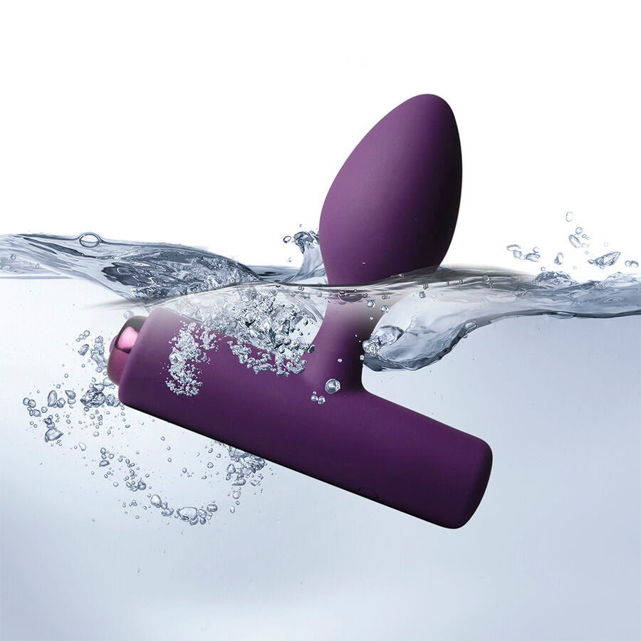 Plug vibrant Nova Solaris violet aubergine à moitié immergé, éclaboussures d'eau