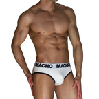 Slip blanc MACHO MCH006 porté de face en angle, liséré noir, ceinture logo MACHO