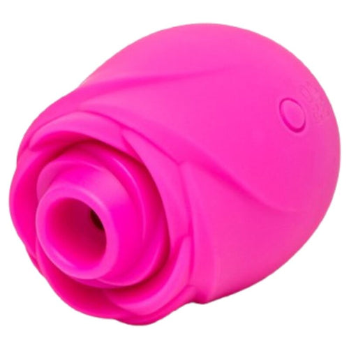 Stimulateur clitoridien par succion Rose ROMP en silicone fuchsia, design petale fleuri avec tete d aspiration centrale, technologie air pulse sans contact direct